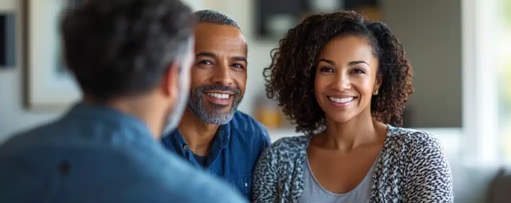 A clinical MFT psychologist counseling two married couples in his office.